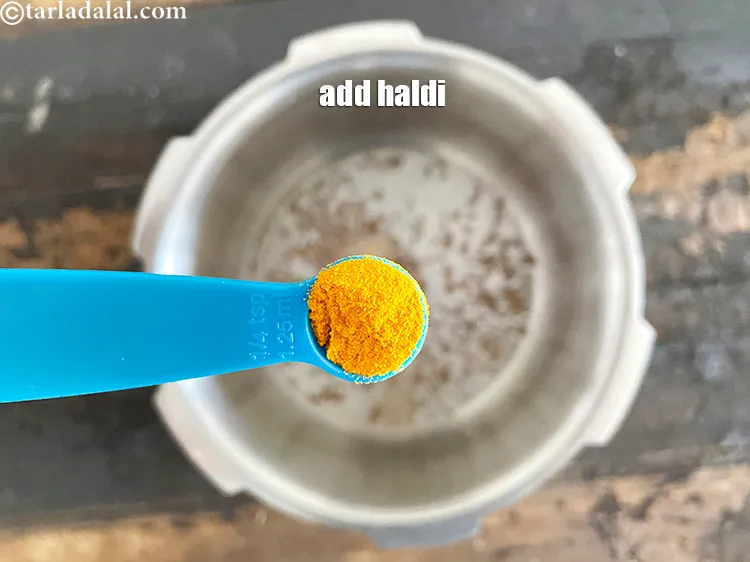 Step 23 – Add&nbsp;<meta charset="UTF-8" />1/4 tsp&nbsp;<a href="glossary-turmeric-powder-haldi-645i">turmeric powder (haldi)</a>.