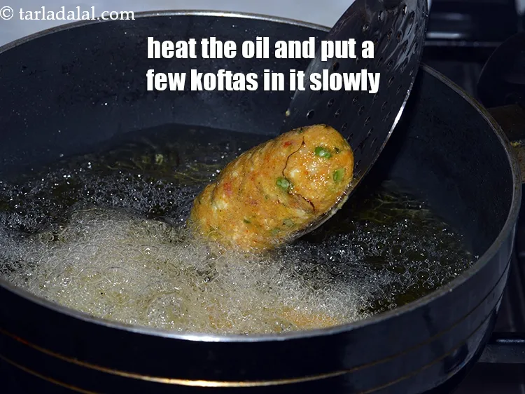 Step 13 – In a deep non-stick kadhai, heat the oil till its hot but not red hot …
