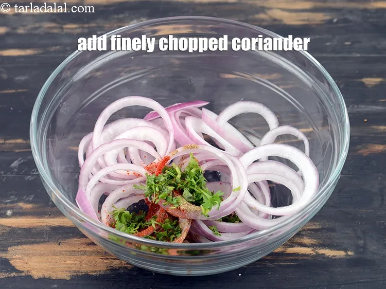 Step 14 – Add 1 tbsp finely &nbsp;<a href="https://www.tarladalal.com/glossary-chopped-coriander-783i">chopped coriander (dhania)</a>.