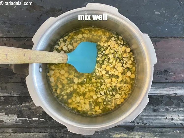 Step 15 – Mix well so that the salt and haldi are mixed.