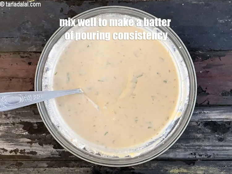 Step 15 – Mix well to make a batter of pouring consistency.