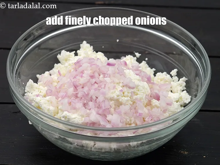 Step 17 – Add &frac14; cup finely&nbsp;<a href="https://www.tarladalal.com/glossary-chopped-onions-722i">chopped onions</a>.