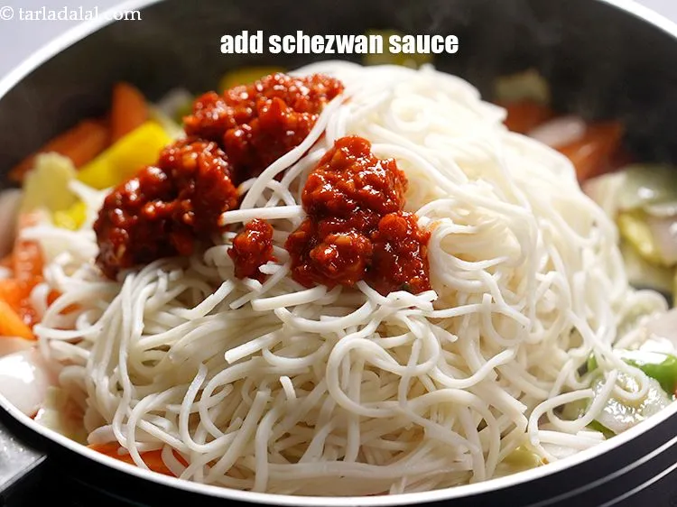 Step 23 – Add 1/4 cup&nbsp;<a href="https://www.tarladalal.com/glossary-schezwan-sauce-schezuan-sauce-1872i">schezwan sauce</a>.&nbsp;