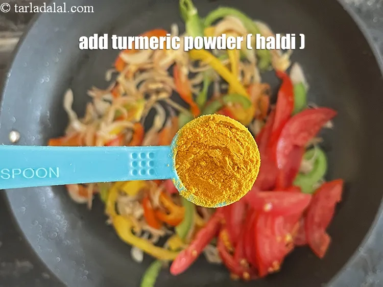 Step 15 – <html><head></head><body><p>Add&nbsp;1&nbsp;tsp&nbsp;<a href="glossary-turmeric-powder-haldi-645i">turmeric powder (haldi)</a>.</p></body></html>