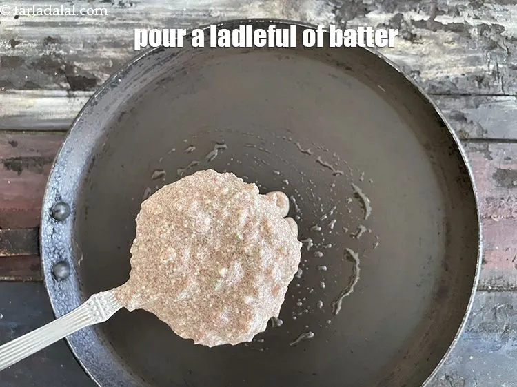 Step 17 – <meta charset="UTF-8" /> Pour a ladleful of the batter on it.