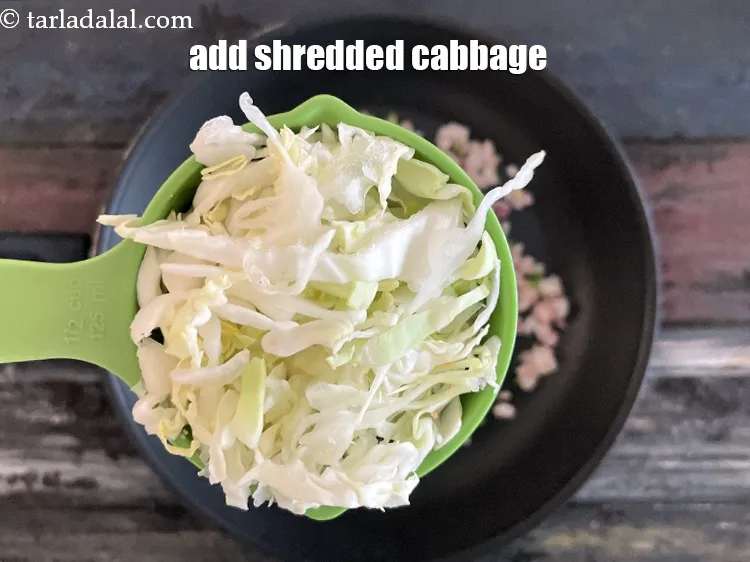 Step 17 – Add&nbsp;<meta charset="UTF-8" />1/2 cup&nbsp;<a href="glossary-shredded-cabbage-763i">shredded cabbage</a>.