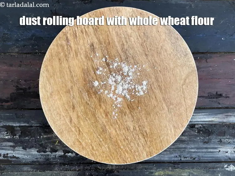 Step 15 – Dust a rolling board with whole wheat flour.