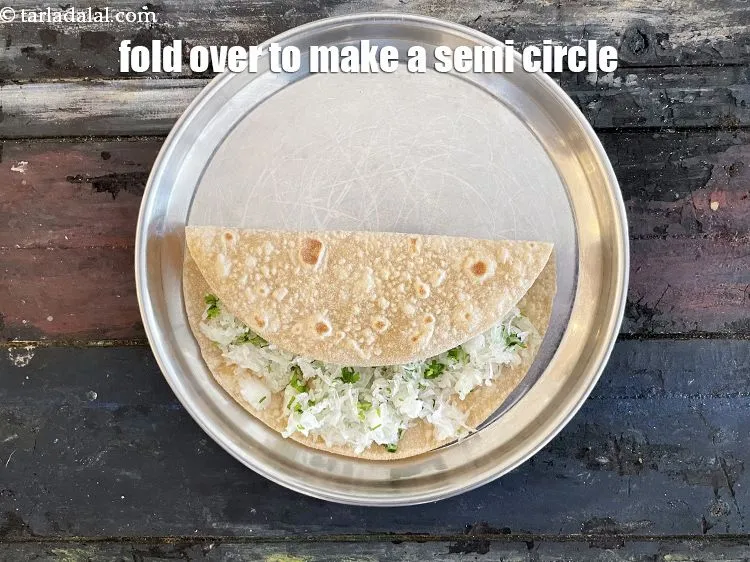 Step 37 – Fold it over to make a semi-circle.