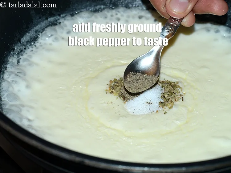 Step 17 – Add <a href="https://www.tarladalal.com/glossary-freshly-ground-black-pepper-kalimirch-powder-kali-mirch-ka-powder-567i">freshly ground black pepper (kalimirch)</a> to taste.
