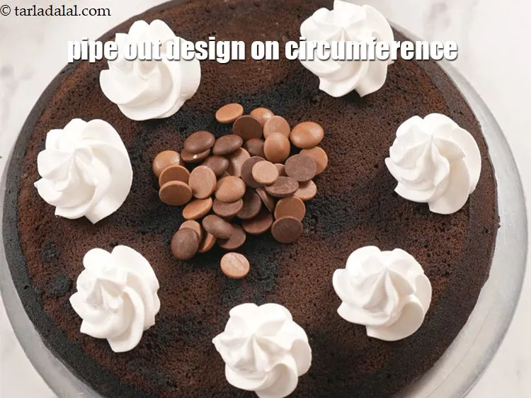 Step 15 – Put the whipped cream in a star nozzle fitted piping bag.&nbsp;Pipe out the design of …