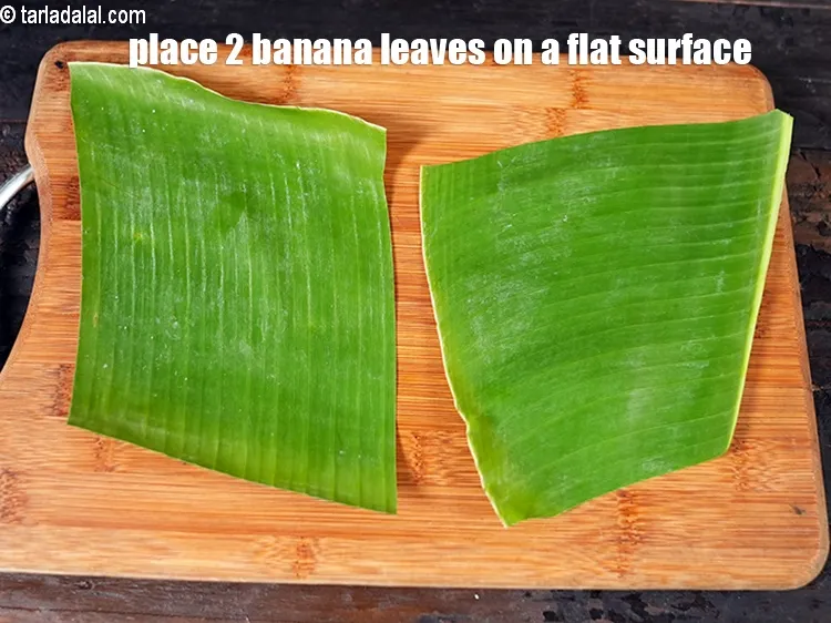 Step 18 – To make <strong>moong sprouts panki recipe | sprouts, oats and besan panki | </strong>&nbsp;place 2 …