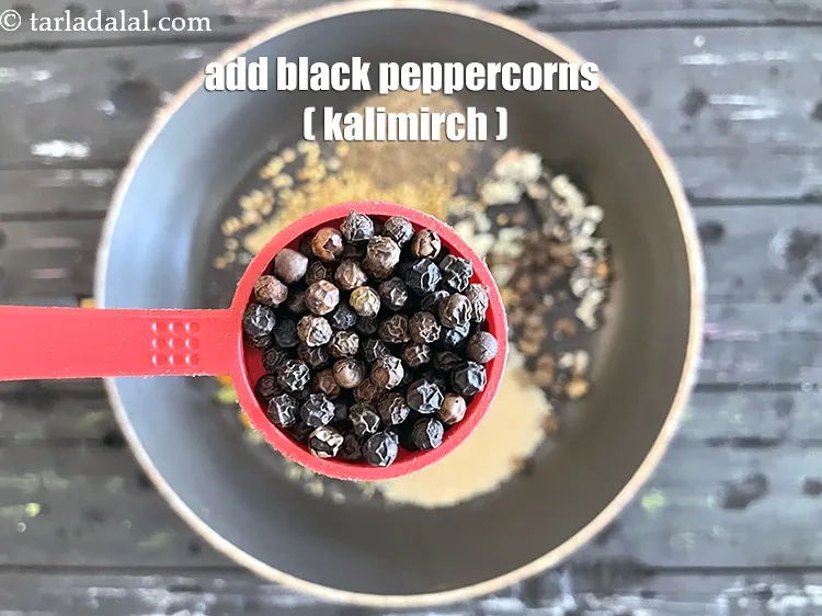 Step 15 – Add&nbsp;<meta charset="UTF-8" />1 tbsp&nbsp;<a href="glossary-black-peppercorns-kali-mirch-kalimirch-566i">black peppercorns (kalimirch)</a>.