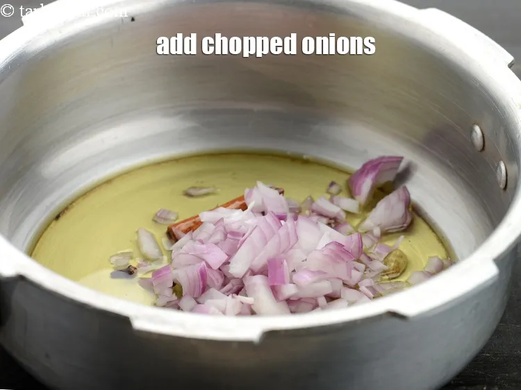 Step 20 – Add 5 tbsp&nbsp;<a href="https://www.tarladalal.com/glossary-chopped-onions-722i">chopped onions</a>.