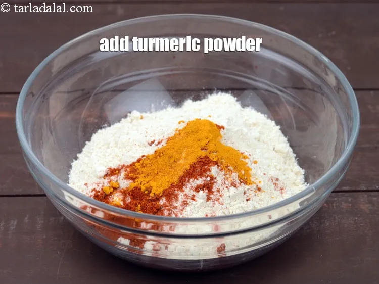 Step 14 – Add 1/4 tsp <a href="https://www.tarladalal.com/glossary-turmeric-powder-haldi-645i">turmeric powder (haldi)</a>.
