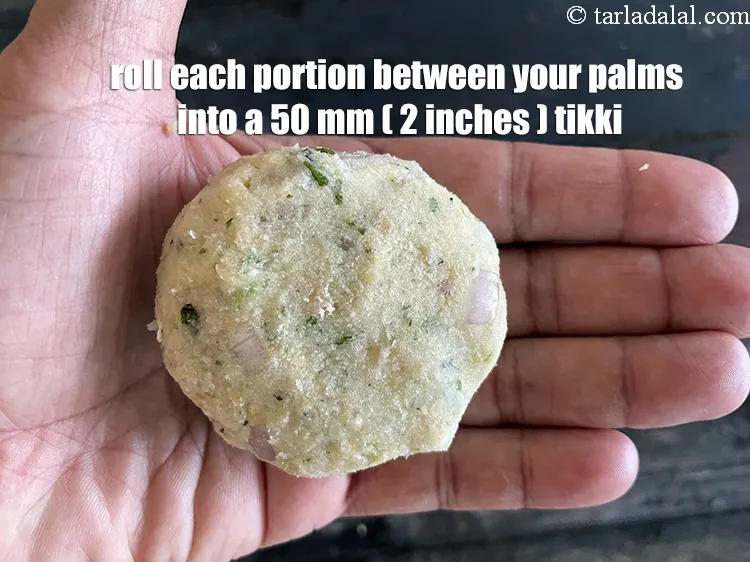Step 30 – Roll each portion between your palms into a 50 mm. (2&rdquo;) diameter round tikki.