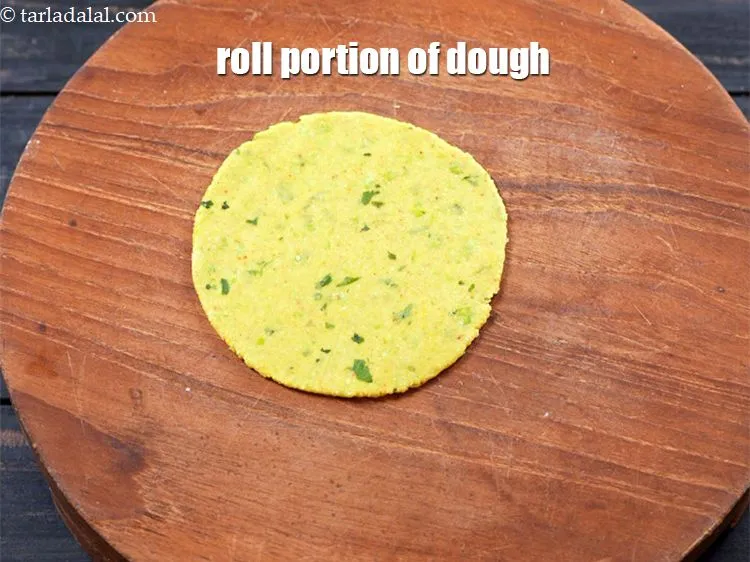 Step 15 – Roll out a portion of the dough into a 100 mm. (4&rsquo;) diameter circle without …