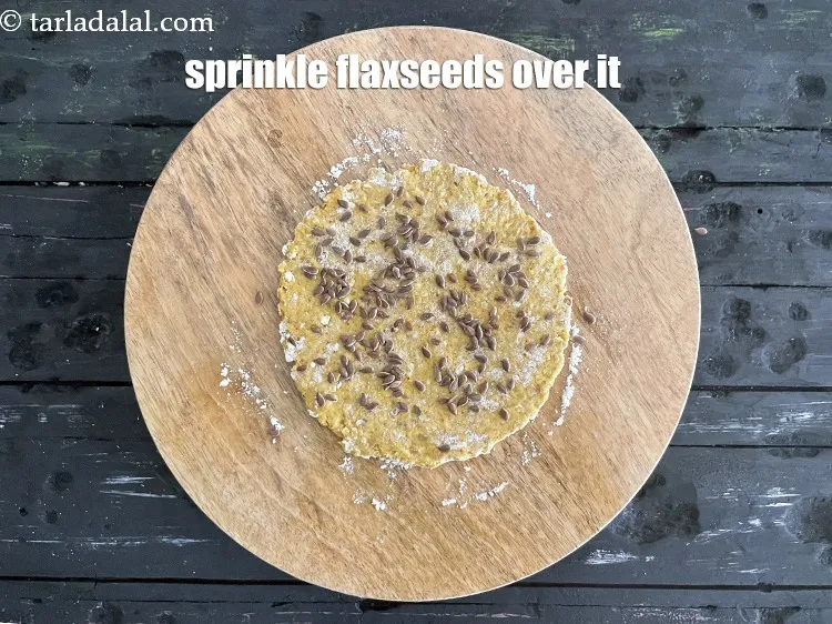 Step 18 – <meta charset="UTF-8" /> Sprinkle &frac12; tsp of flax seeds evenly over it.