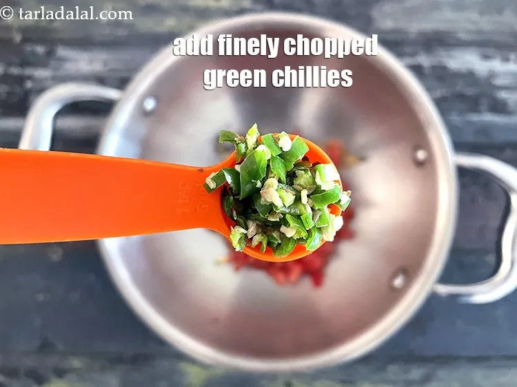 Step 23 – Add&nbsp;<meta charset="UTF-8" />1 tsp&nbsp;finely&nbsp;<a href="glossary-chopped-green-chilli-820i">chopped green chillies</a>.