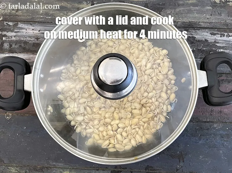 Step 20 – Cover with a lid and cook on a medium flame for 4 minutes, while stirring …
