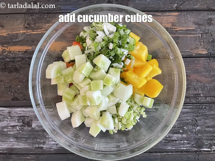 Step 17 – Add&nbsp;<meta charset="UTF-8" />1 cup&nbsp;<a href="glossary-cucumber-cubes-726i">cucumber cubes</a>.