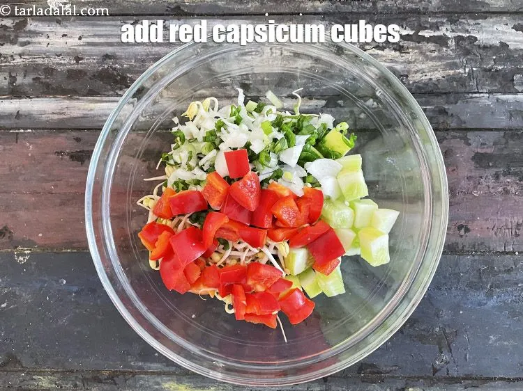 Step 21 – Add&nbsp;1/2 cup&nbsp;<a href="glossary-red-capsicum-cubes-2077i">red capscium cubes</a>.