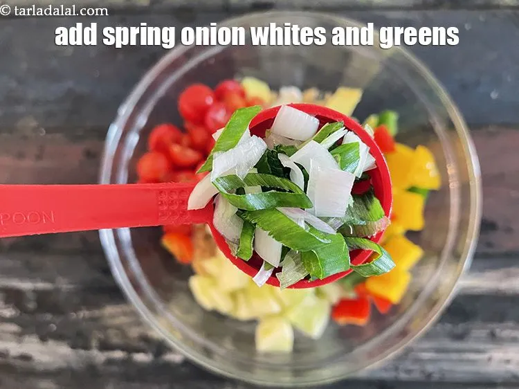 Step 23 – Add&nbsp;2 tbsp&nbsp;finely spring onion whites and greens.