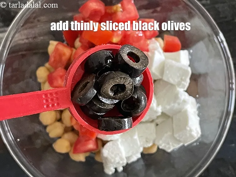 Step 27 – Add&nbsp;<meta charset="UTF-8" />2 tbsp&nbsp;thinly&nbsp;<a href="glossary-sliced-black-olives-1069i">sliced black olives</a>.