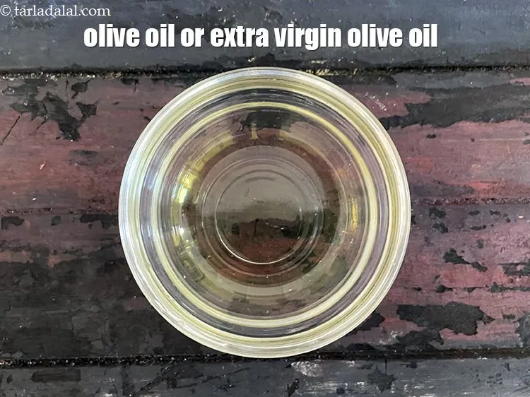 Step 11 – In a bowl put&nbsp;1 tbsp&nbsp;<a href="glossary-olive-oil-451i">olive oil</a>.