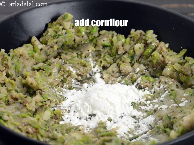 Step 16 – Once cooled, add 2 tbsp <a href="https://www.tarladalal.com/glossary-cornflour-cornstarch-maize-starch-corn-flour-112i">cornflour</a>.&nbsp;