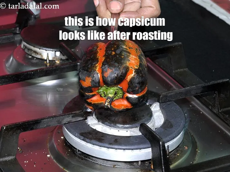 Step 16 – This is how the&nbsp;capsicum looks like after roasting. The skin will turn black in colour.&nbsp;