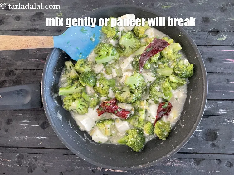 Step 34 – <u><em>Mix gently or the paneer will break up.</em></u>