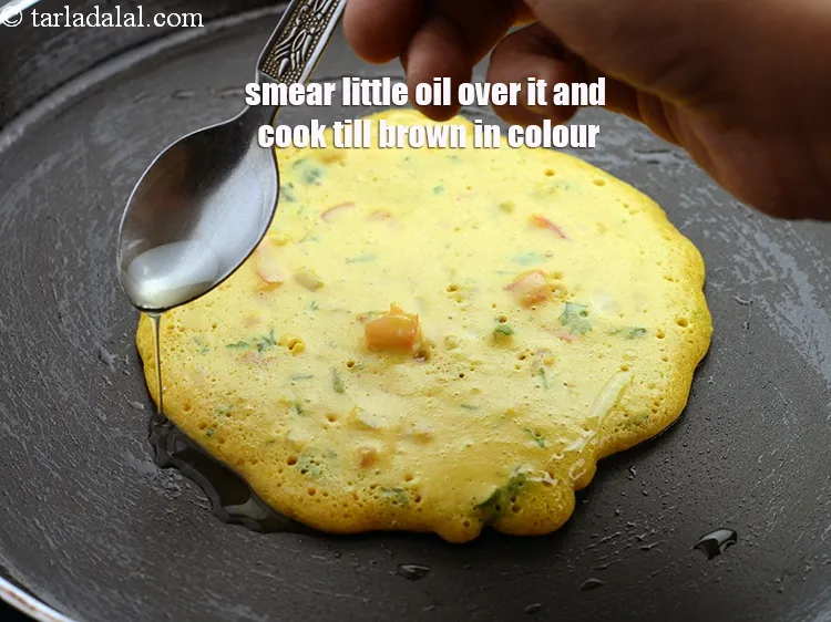 Step 15 – Smear a little oil over it and along the edges and cook on a medium …