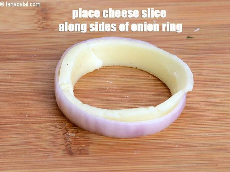 Step 16 – Place mozzarella cheese slice along the sides of the onion ring.