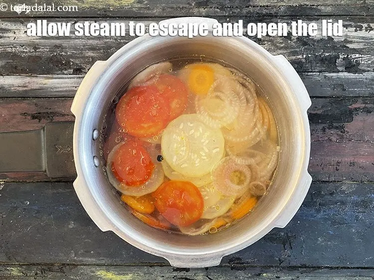 Step 15 – Allow the steam to escape before opening the lid.