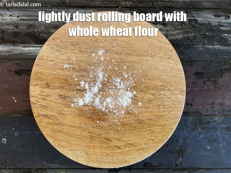 Step 16 – Lightly dust the rolling board using little whole wheat flour.