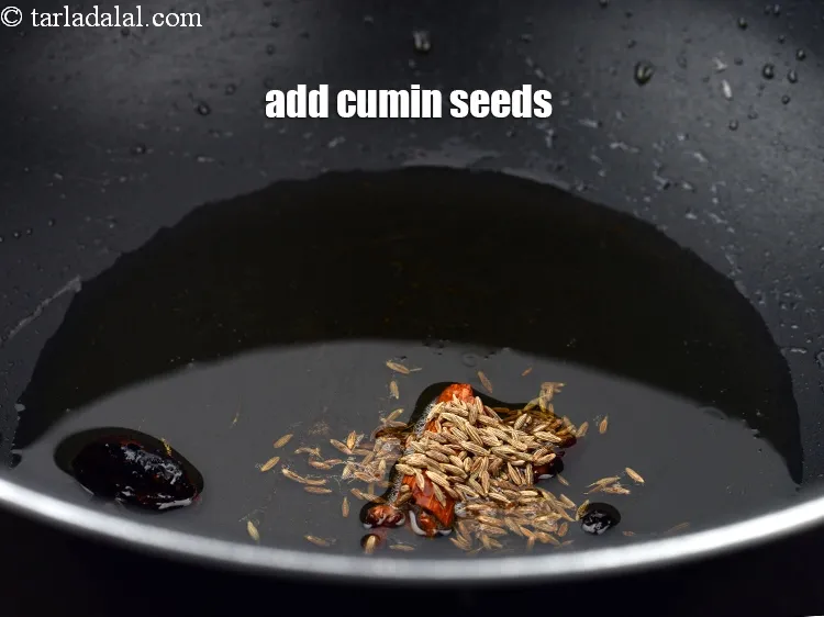 Step 16 – Add &frac12; tsp <a href="https://www.tarladalal.com/glossary-cumin-seeds-jeera-zeera-381i">cumin seeds (jeera)</a>.
