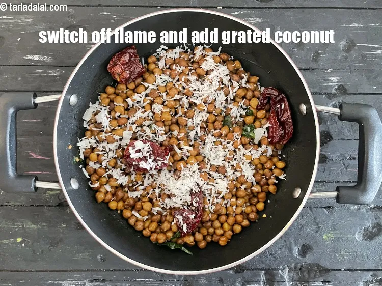 Step 27 – Switch off the flame, add <meta charset="UTF-8" />1/4 cup&nbsp;freshly&nbsp;<a href="glossary-grated-coconut-852i">grated coconut</a>.