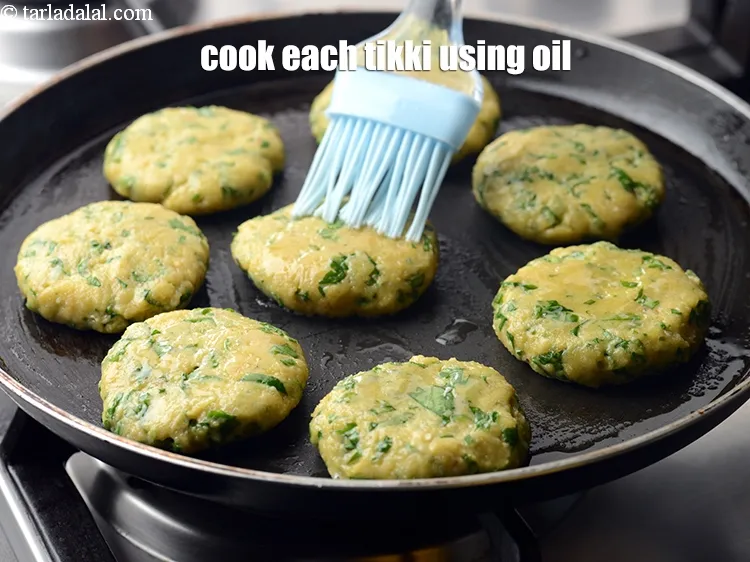 Step 14 – Cook each tikki on it using &frac14; tsp of oil.