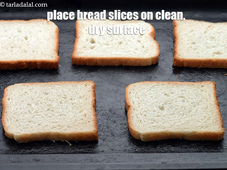 Step 15 – Place 5&nbsp;<a href="https://www.tarladalal.com/glossary-bread-219i">bread</a>&nbsp;slices on a clean, dry surface.
