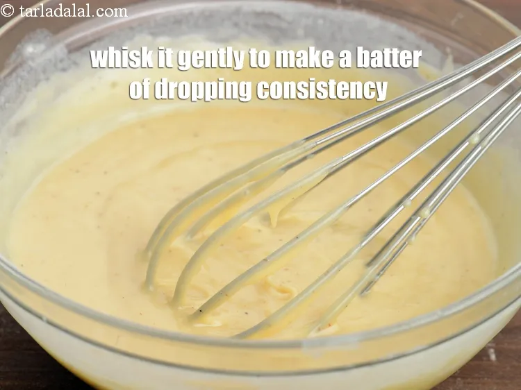 Step 15 – Whisk it gently to make a batter of dropping consistency.