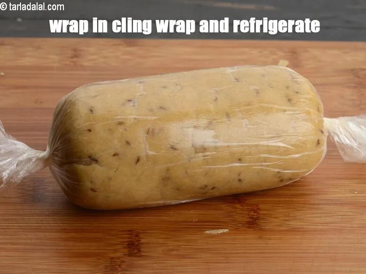 Step 13 – Make a cylindrical shape roll of the dough. Wrap in cling wrap and refrigerate for …
