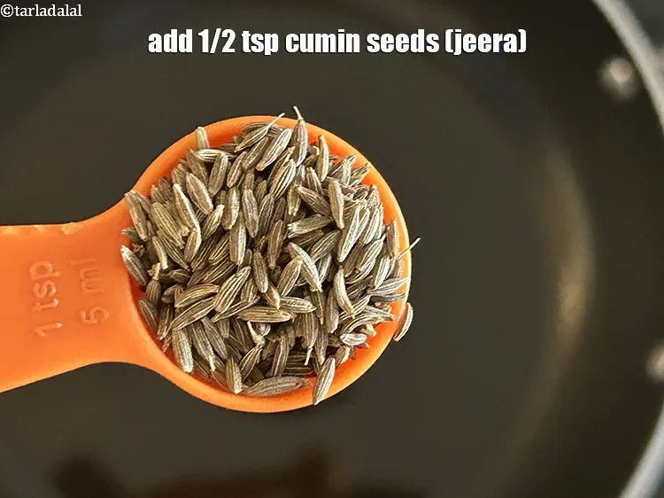 Step 16 – Add 1/2<strong>&nbsp;</strong>tsp&nbsp;<a href="glossary-cumin-seeds-jeera-zeera-381i">cumin seeds (jeera)</a>.