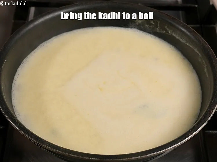 Step 18 – Bring the kadhi to a boil.