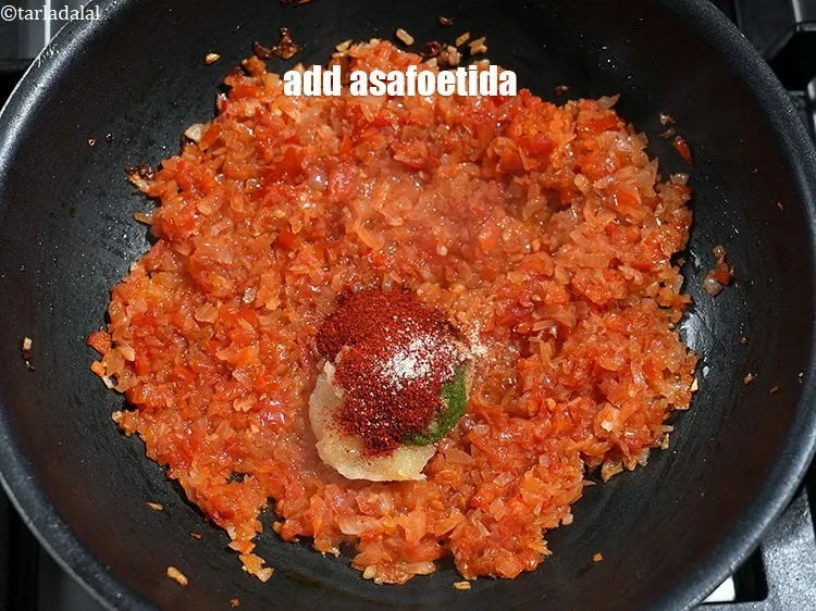 Step 16 – Add a pinch of asafoetida.&nbsp;