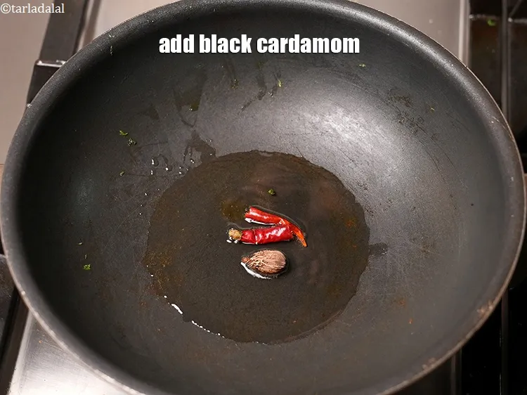 Step 16 – Add 1 black cardamom.