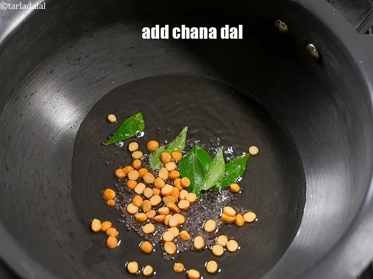 Step 16 – Add 1 tbsp chana dal.