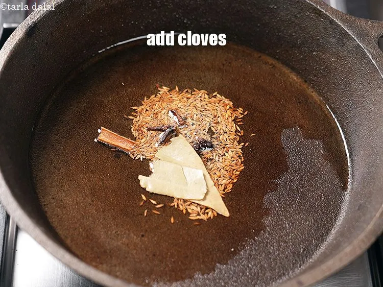 Step 23 – Add 3 cloves.