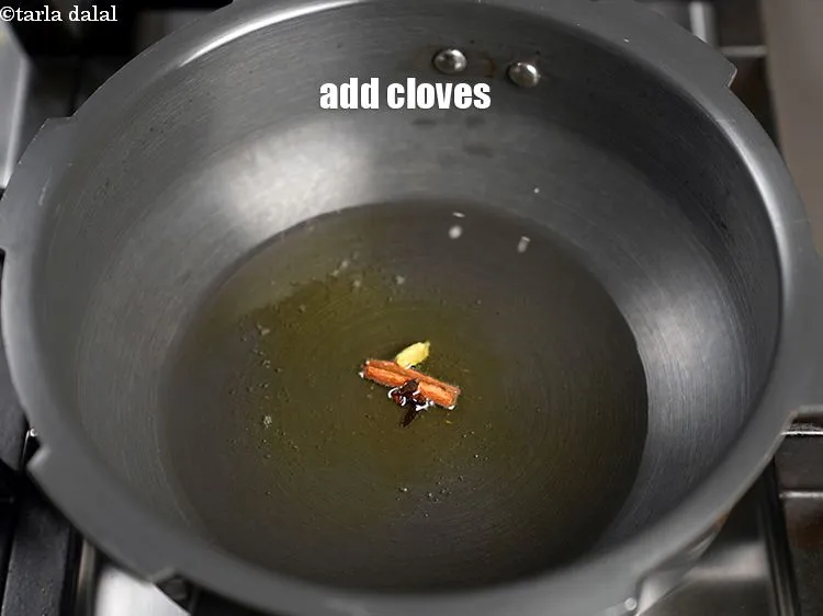 Step 16 – Add 2 cloves.