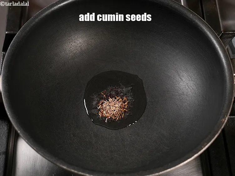 Step 16 – Add &frac12; tsp <a href="https://www.tarladalal.com/glossary-cumin-seeds-jeera-zeera-381i">cumin seeds (jeera)</a>.&nbsp;
