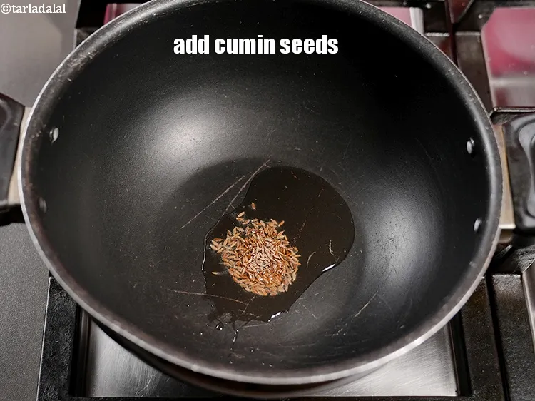Step 16 – Add &frac12; tsp <a href="https://www.tarladalal.com/glossary-cumin-seeds-jeera-zeera-381i">cumin seeds (jeera)</a>.&nbsp;
